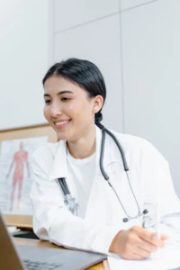 A photo of a smiling woman with a stethoscope 