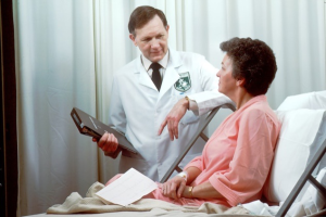 A doctor speaking to a patient