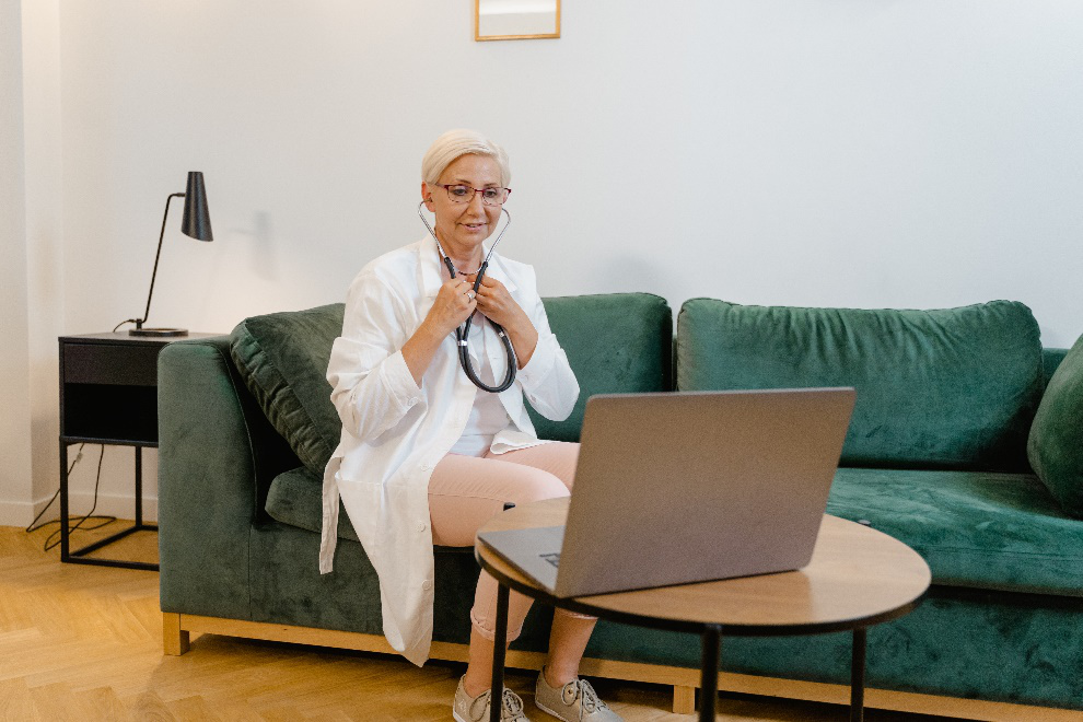 Doctor looking at her laptop