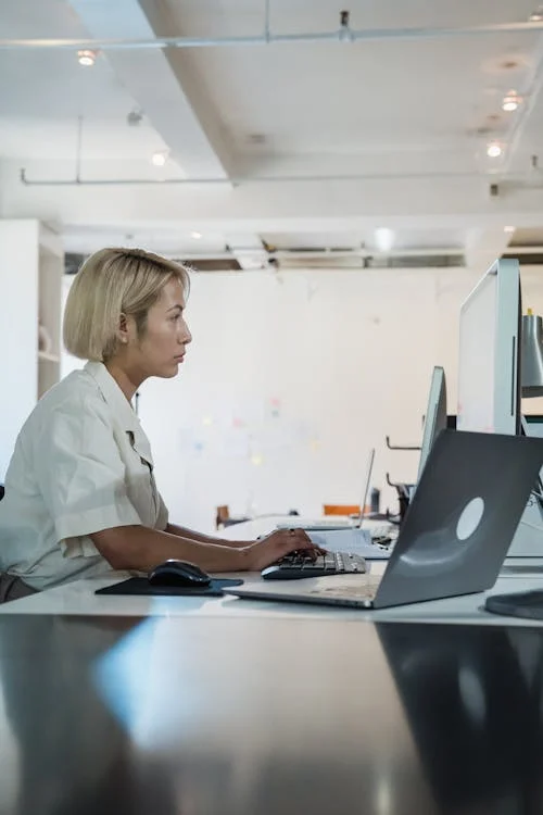 A woman at work using a computer 